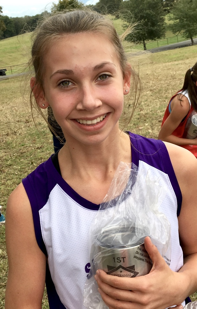 Girl Brings Home Cross Country Prize
