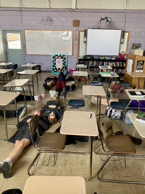 freshmen meditating in classroom